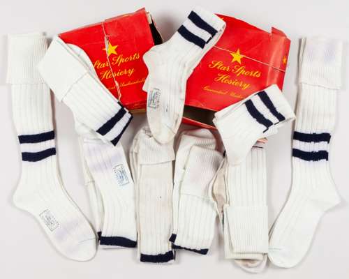 Twelve pairs of white and blue vintage socks