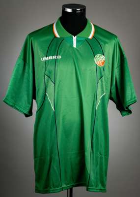 Green Republic of Ireland no.4 home jersey, circa 1995,
 Umbro, short-sleeved with FA Ireland badges and Umbro logo, reverse numbered 4, size XL