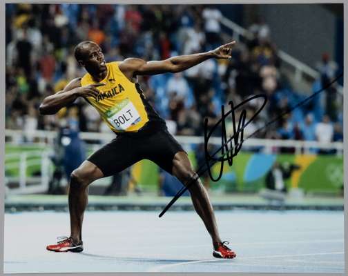 Usain Bolt 2008, 2012 & 2016 100m & 200m Olympic Gold medal winner original signed colour 10 by 8in. photograph,
 depicting Usain Bolt in trademark li