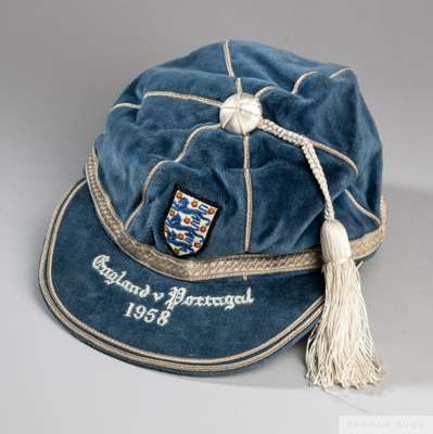 Blue England v Portugal International cap, 1958
 the blue velvet cap with white tassel and silvered braiding, embroidered with the England three lion 