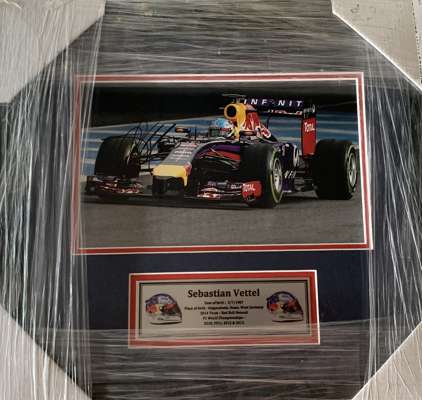 Sebastian Vettel signed/framed action Red Bull Racing photograph, 
 Vettel has just announced his retirement and was a triple World Champion with Red 
