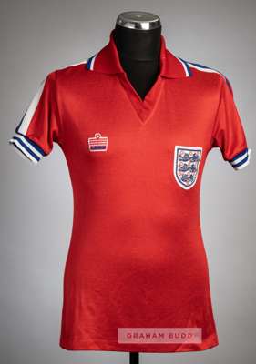 Red England No.10 away jersey, circa 1980,
 Admiral, short-sleeved, with embroidered three lion country emblem badge and Admiral badge, reverse number