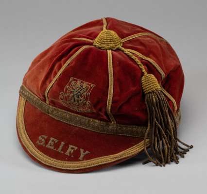 Ray Daniel Wales international football cap season 1952-53,
 red, inscribed with initials representing appearances v Scotland, England, Ireland, Franc