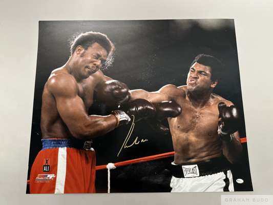 Rumble in the Jungle fight action photographed
 autographed by Muhammad Ali, marker authenticated by Online Authentics.com. OA-8305730, 50 by 60cm. un