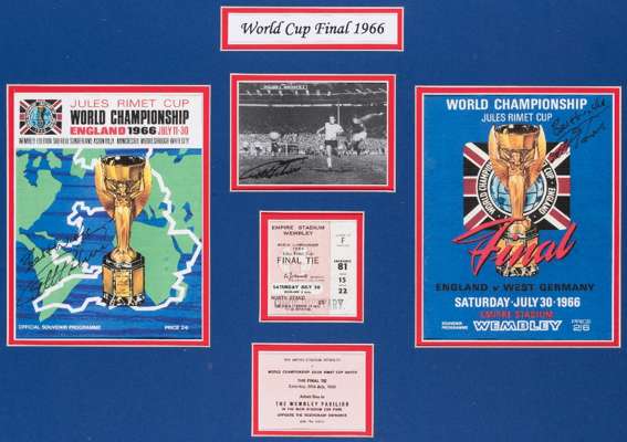 A Geoff Hurst signed 1966 World Cup memorabilia display, comprising the Final and Tournament programmes, both signed in black market pen by Hurst, a F