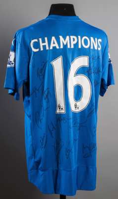 Leicester City commemorative shirt signed by the 2015-16 Premier League Champions the blue shirt lettered & numbered to the reverse CHAMPIONS, 16, 17 