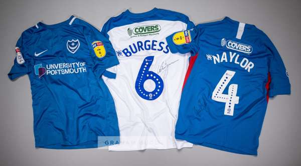 Three signed Portsmouth FC jersey's,
 comprising David Wheeler blue and white no.22 home jersey, season 2018-19, short-sleeved with SKYBET WHEN THE FU