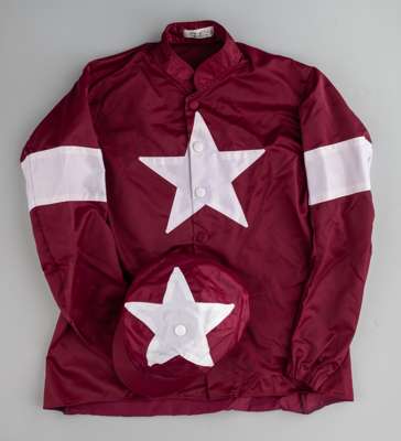 Gigginstown House Stud racing silks,
 maker's label for Josephine O'Brien, with initials in black marker G.E. (Gordon Elliott), maroon jacket and cap 