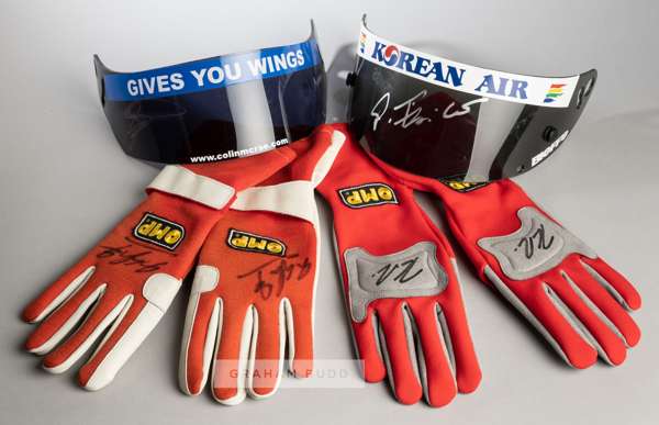 Two pairs of F1 drivers gloves, one pair signed by Michael Schumacher and the other by Felipe Massa, 
 singed in black marker pan, sold together with 