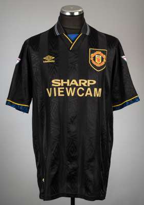 Andrei Kanchelskis black Manchester United no.14 away jersey, season 1993-94,
 Umbro, short-sleeved with THE FA PREMIER LEAGUE CHAMPIONS 1992-1993 sle