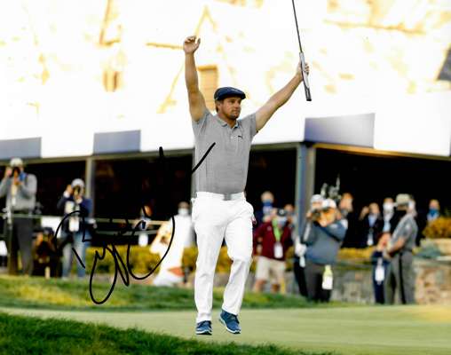 “US Open Champions Collection” of eight 8 by 12in. photographs signed by winners,
 including Curtis Strange (1988 & 1989), Geoff Ogilvy (2006), Graeme