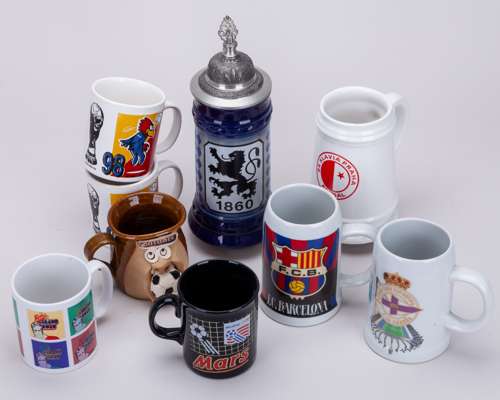 A collection of Leeds United and other ceramic tankards/mugs
