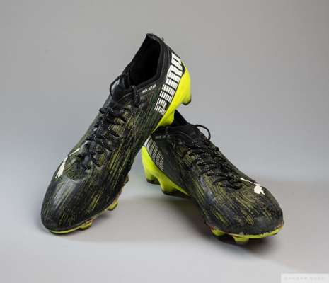 Pair of black and yellow match worn Mario Balotelli Puma Ultra football boots, 2021-22
 each boot personalised, each in used condition, with COA from 