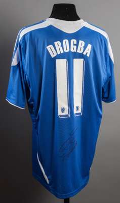 Didier Drogba signed replica Chelsea jersey from the 2011-12 Champions League winning season, signed in black marker pen below the reverse No.11