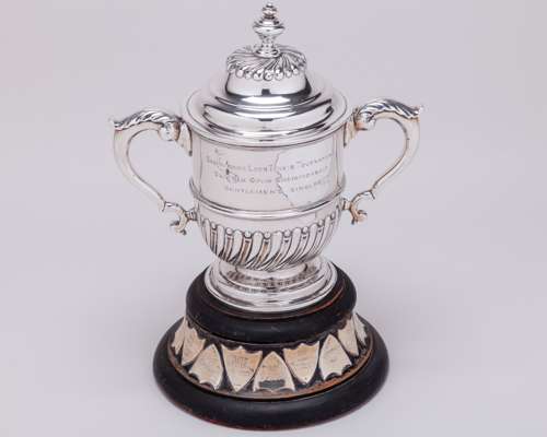 A silver Saxmundham Lawn Tennis Tournament trophy