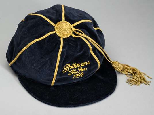 Rothmans All Stars XI cap awarded in 1992,
 navy velvet cap with gilt tassel and braiding, embroidered ROTHMANS ALL STARS 1992, with makers label Toye
