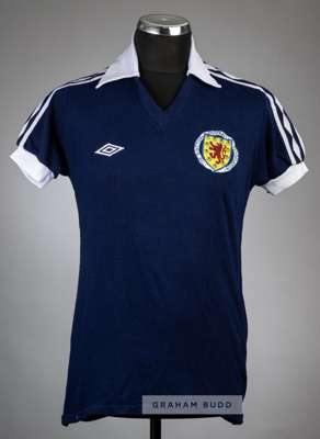Lou Macari signed blue Scotland No.6 jersey, circa 1970s,
 Umbro, short-sleeved with embroidered national emblem, reverse numbered 6 and signed in mar