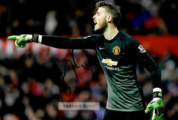 Manchester United Collection of signed photos of past and present players,
 including David de Gea, Juan Mata, Ander Herrera, Robin Van Persie, Tom Cl