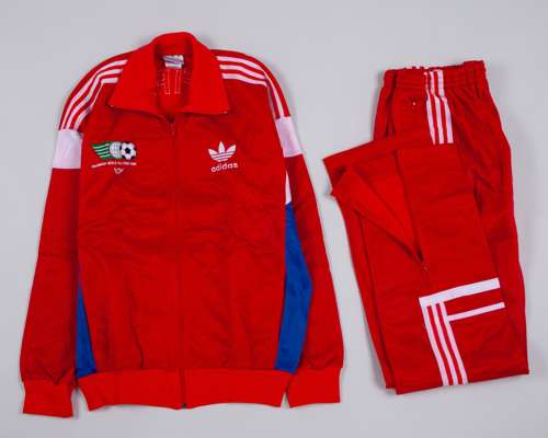Pat Jennings red and white FIFA/UNICEF ALL STAR Game tracksuit top and bottoms, 1986