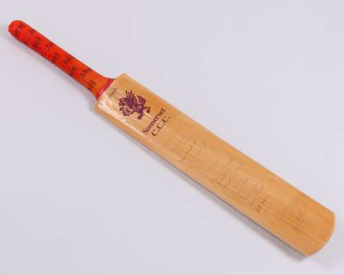 A Somerset County Cricket Club autographed cricket bat, bearing twenty autographs