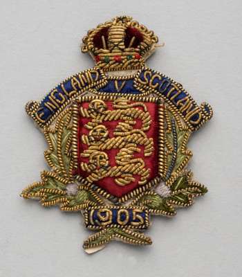 England v Scotland badge for Home International Championship, played at Sports Arena, Crystal Palace Park, 1st April 1905,
 silk and wirework badge, w