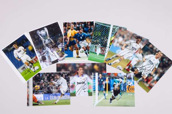 A collection of nineteen Real Madrid related autographed photographs