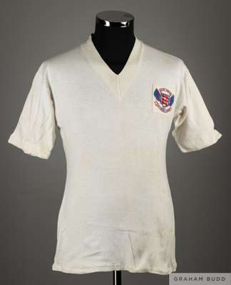 White No.10 Football League v. Irish Football League match worn short-sleeved shirt, 1958, 
 Umbro, 38, with v-neck collar and embroidered cloth badge