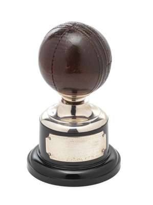 A collection of trophies and memorabilia relating to the career of the Lancashire cricketer Malcolm Hilton. 

 including a cricket ball trophy awarded