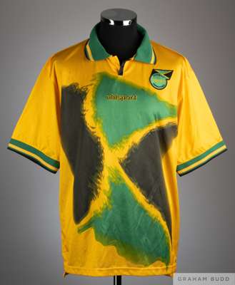 Squad signed yellow and green No.16 Jamaica short sleeved shirt, 2005-06, 
 Unisport, size 46/48, V neck with embroidered cloth badge, reverse signed 