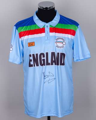 Sir Ian Botham signed light blue England Cricket short-sleeved shirt
