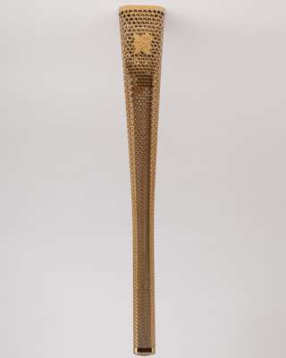 2012London Olympic Games bearer's torch, of tapering, triangular form gold coloured