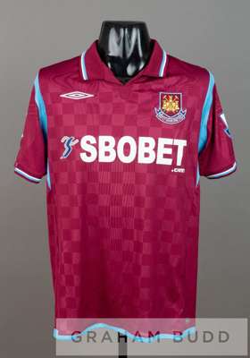 Herita Ilunga claret and blue West Ham United No.23 home jersey v Arsenal at Upton Park, 25th October 2009,
 short-sleeved with BARCLAYS PREMIER LEAGU