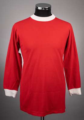 George Best red No.7 Manchester United jersey, 1967-68, 
 Umbro, with crew-neck collar

 The jersey was worn by George Best and given to Tommie Hamilt