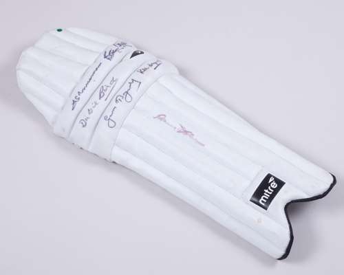 Autographed white Mitre cricket batting pad, with six autographs including Geoffrey Boycott
