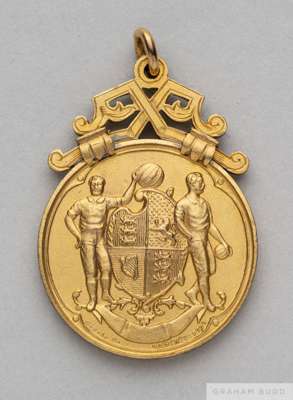 An interesting specimen F.A. Cup winner's medal circa 1900
 design produced in gilt-metal by the medal maker for approval by The Football Association