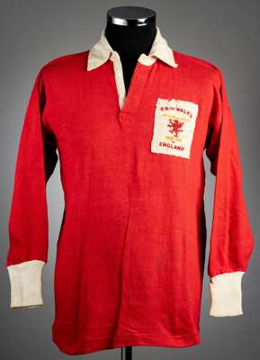 Arsenal’s Ray Daniels Red Wales no.5 football jersey v England 1951-52, 
 Jack Sharp, long-sleeved with white collar and cuffs, bearing white felt emb