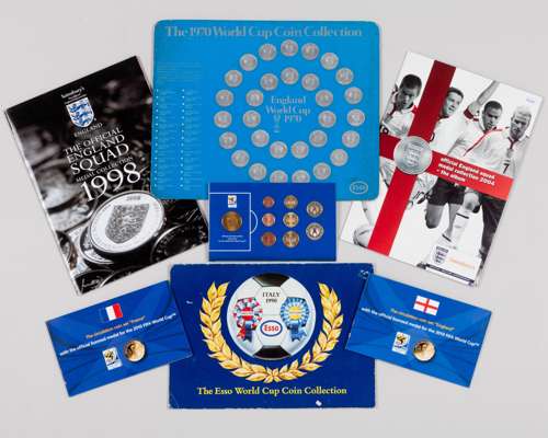 A mixed collection of World Cup memorabilia including World Cup coins