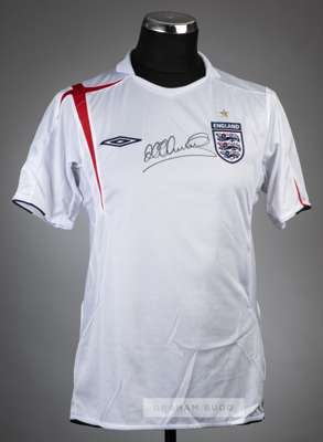 Michael Owen signed white England replica jersey,
 Umbro, signed in black marker pen to front