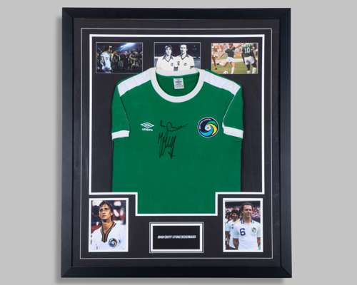 A Johan Cruyff and Franz Beckenbauer autographed green New York Cosmos replica shirt display