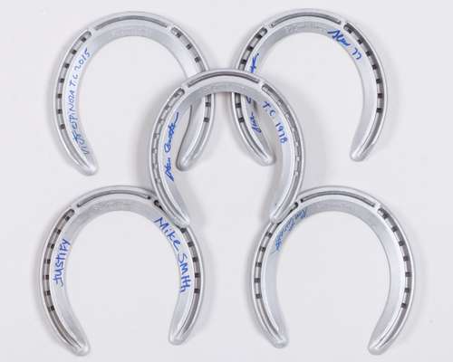 A set of five racing plates signed by five American Triple Crown winning jockeys