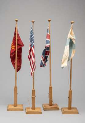 Olympic Games 1940 Helsinki four table flags,
 20in. high with flags of Finland, Great Britain, USA and Russia, the base of Finland flag has Helsinki 