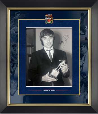 George Best autographed and stylishly framed b&w photograph.
 measuring 18 by 16in., hand signed by George in fine black sharpie. Photograph shows Bes
