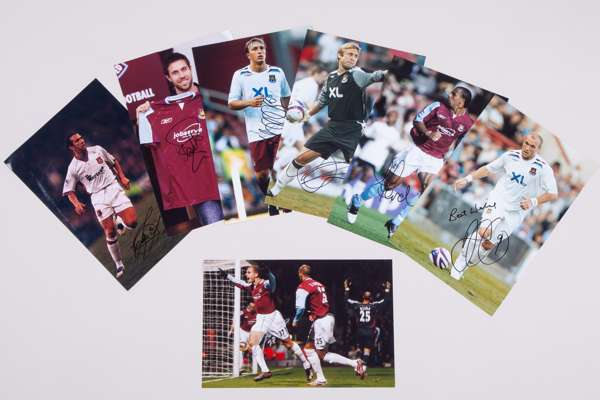 A collection of twenty-five autographed West Ham United photographs
