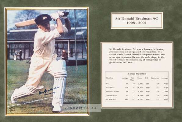 Sir Don Bradman signed colour photograph display
 The image portraying a front foot drive in the nets during the 1948 tour.  Signed in blue marker pen