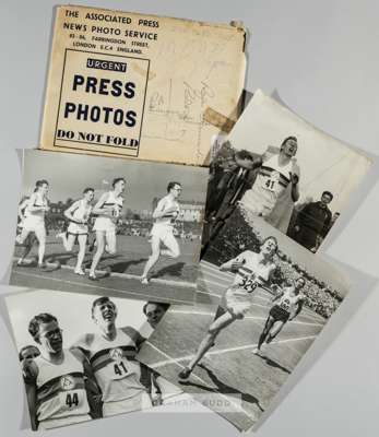 Four b & w press photographs of Roger Bannister,
 three action photographs and one with team, 15 by 20cm., (4)

 Roger Bannister is a former middle di