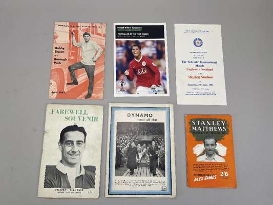Substantial lot of various booklets & Panini sticker books, 
 not sorted or checked but includes Workington Town Bobby Brown Tribute handbook 1967, St