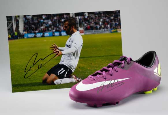 A Nike Mercurial football boot autographed by Rafa Van Der Vaart, 
 with certificate of authenticity from Premier Autographs in perspex case with sign