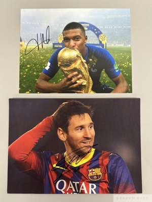 Colour autographed photographs of Lionel Messi and Kylian Mbappe
 and collection of twelve French International autographs including Karim Benzema, Di