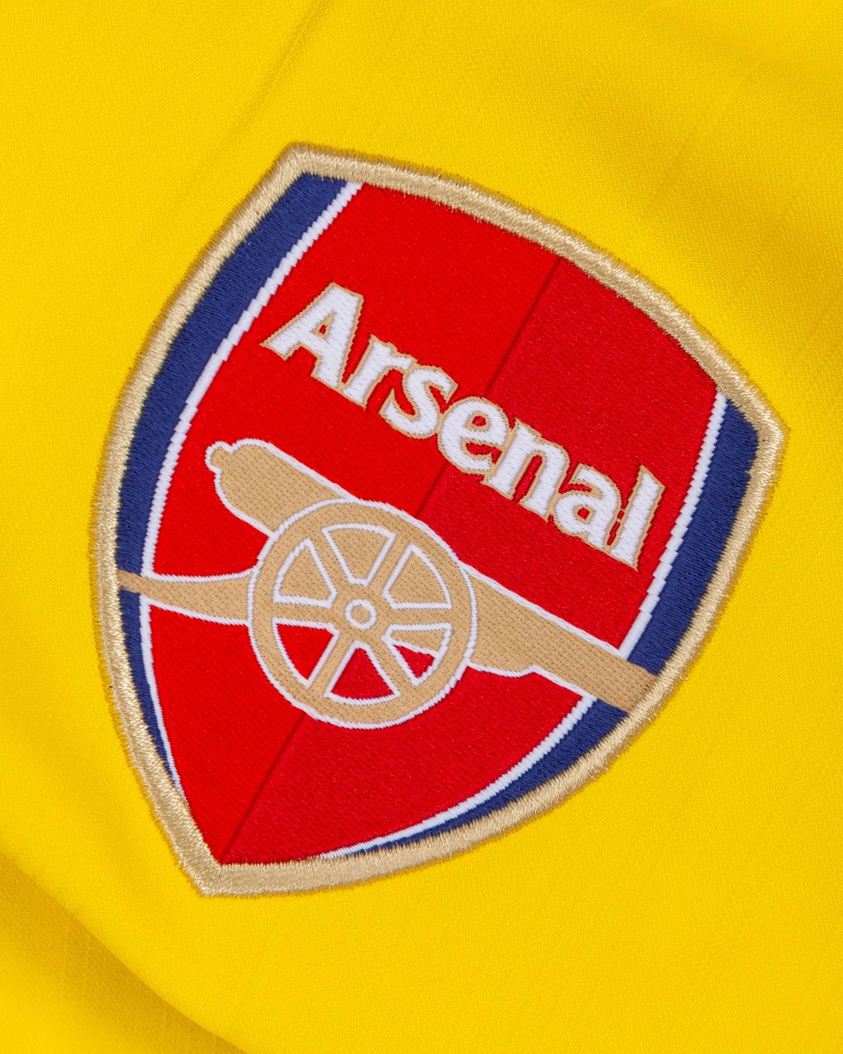 Dennis Bergkamp yellow No.10 Arsenal long-sleeved shirt, 2004-05