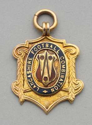 Accrington Stanley 9ct gold medal for Lancashire Football Combination Cup Winners 1937-38 awarded to W Pickering, 
 obverse with crest for Lancashire 